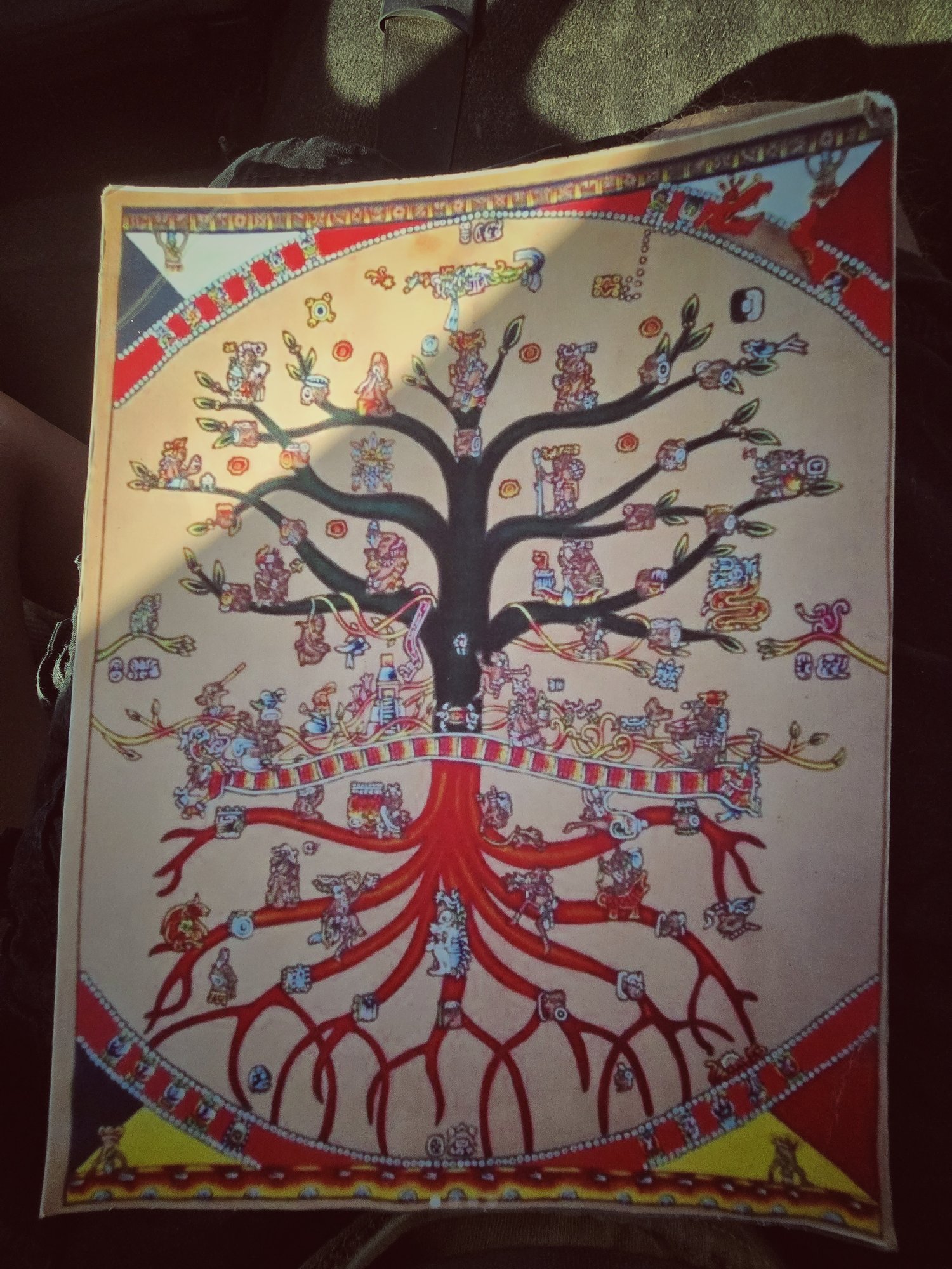A Mesoamerican codex-style painting of a tree with red roots on amate paper