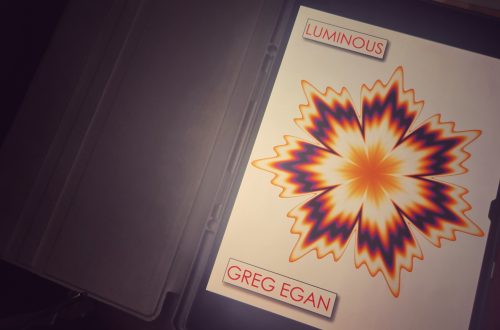 Greg Egan's short story collection Luminous displayed on a tablet screen in a folio case